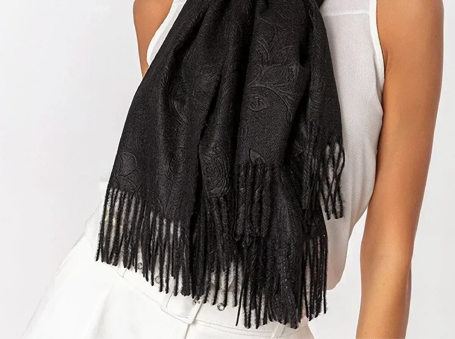 Black embossed shawl wrapped around the neck
